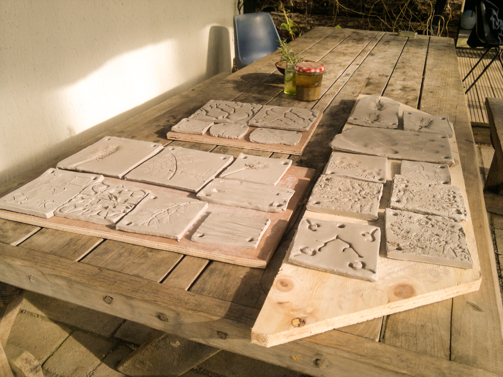 98 hand-made and painted ceramic tiles later...